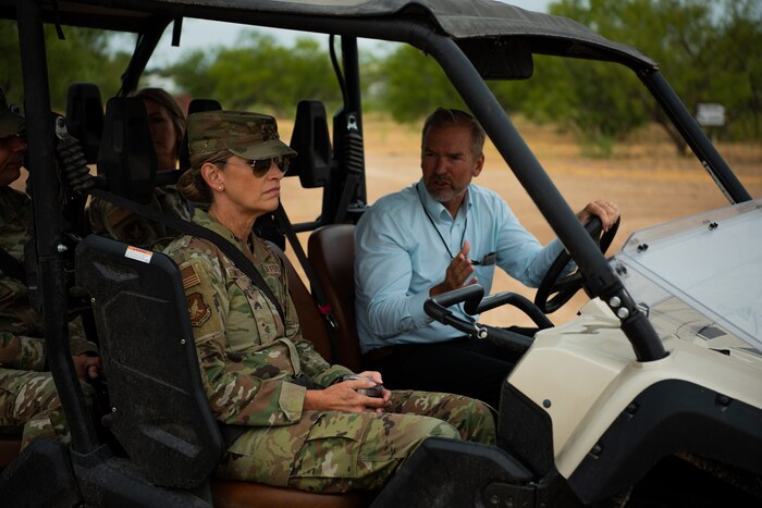 U.S. Air Force Maj. Gen. Michele Edmondson, Second Air Force commander, receives a tour of Forward Operating Base Sentinel during the Bazaar of Falcons event, Goodfellow Air Force Base, Texas, Aug. 25, 2022. FOB Sentinel is the premiere training ground used by the 344th Military Intelligence Battalion for their students’ capstone exercise. (U.S. Air Force Photo by Senior Airman Michael Bowman)
