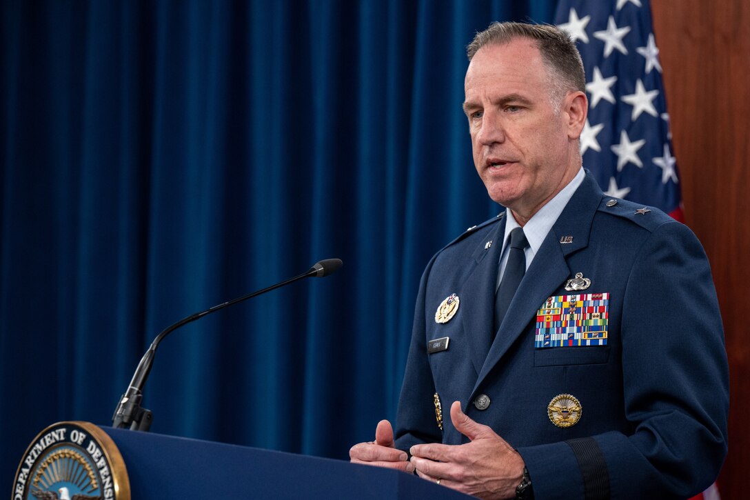 Pentagon Press Secretary Air Force Brig. Gen. Pat Ryder speaks at a lectern.