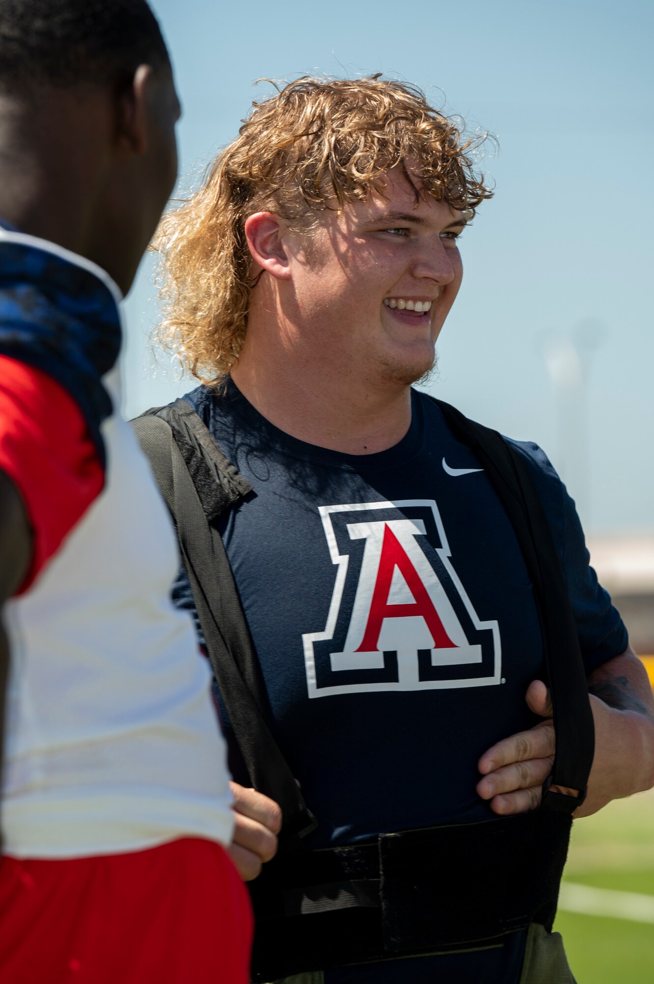 Photo of a man smiling.