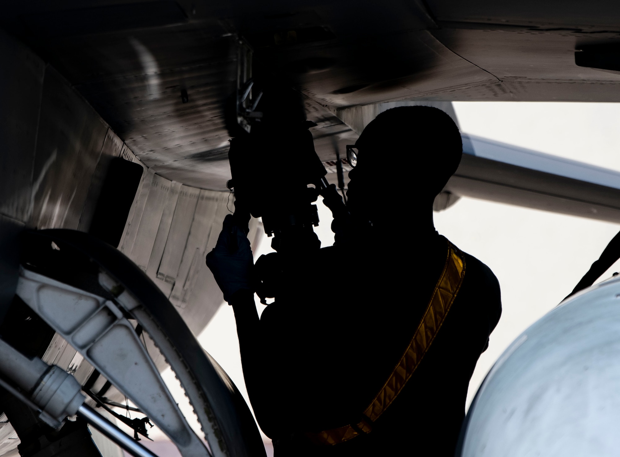 Airman 1st Class Amari Grant, 80th Fighter Generation Squadron crew chief, connects a fuel hose line to an F-16 Fighting Falcon at Kunsan Air Base, Republic of Korea, Aug. 26, 2022.  Crew chiefs regularly work with 8th Logistics Readiness Squadron fuels distribution operators in order to properly fuel their aircraft. (U.S. Air Force photo by Staff Sgt. Sadie Colbert)