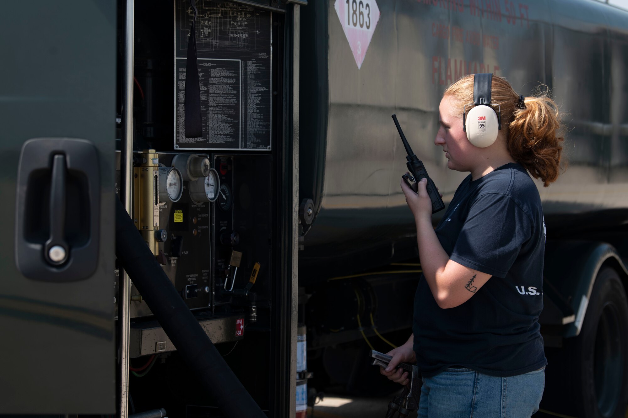 Airman 1st Class Maggie Bennett, 8th Logistics Readiness Squadron fuels distribution operator, announces the start of fueling an F-16 Fighting Falcon at Kunsan Air Base, Republic of Korea, Aug. 26, 2022. The fuels distribution flight is responsible for fueling Kunsan’s F-16 fleet, which continues to support a free and open Indo-Pacific. (U.S. Air Force photo by Staff Sgt. Sadie Colbert)