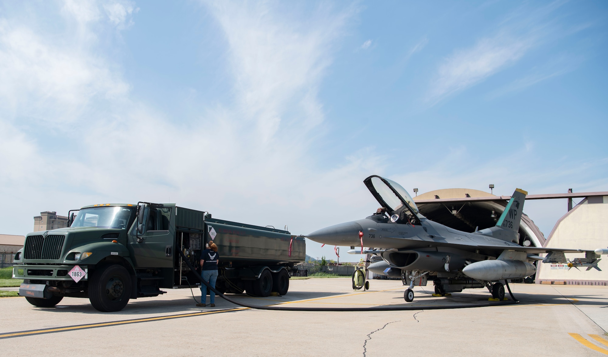 Airman 1st Class Maggie Bennett, 8th Logistics Readiness Squadron fuels distribution operator, fuels an F-16 Fighting Falcon at Kunsan Air Base, Republic of Korea, Aug. 26, 2022. The fuels distribution flight is responsible for fueling Kunsan’s F-16 fleet, which continues to support a free and open Indo-Pacific. (U.S. Air Force photo by Staff Sgt. Sadie Colbert)