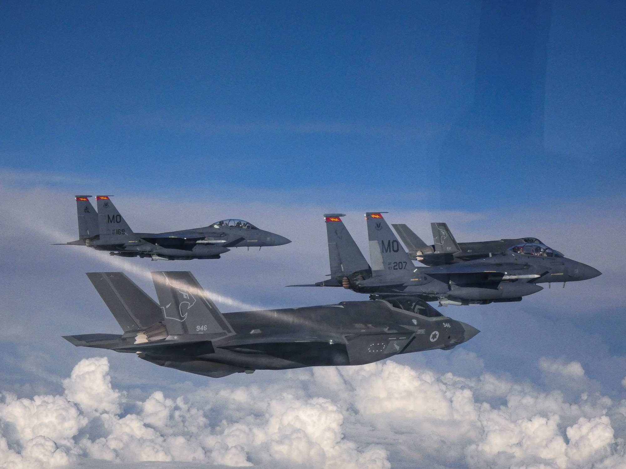 U.S. Air Force F-15E Strike Eagles and Israeli Air Force F-35 Lightening II fly in formation as part of a bilateral exercise in the U.S. Central Command area of responsibility, Nov. 29, 2022. (U.S. Air Force courtesy photo)