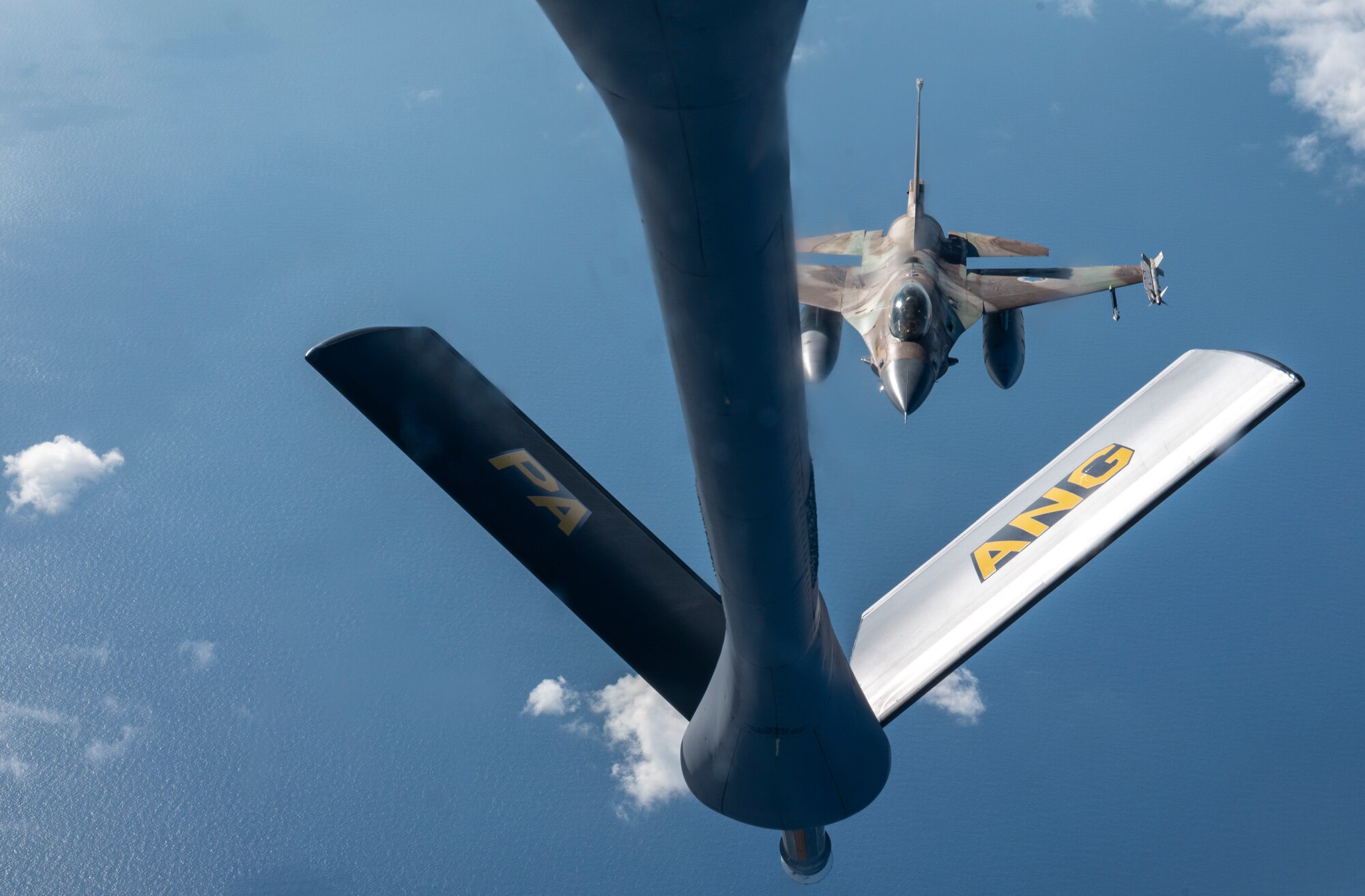An Israeli Air Force F-16 Fighting Falcon prepares to receive refuel from a U.S. Air Force KC-135 Stratotanker assigned to the 340th Expeditionary Air Refueling Squadron, as part of a bilateral exercise in the U.S. Central Command area of responsibility, Nov. 30, 2022. The exercise demonstrated fighter aircraft integration and escort as well as refueling operations as part of the first of several exercises to maintain the ironclad commitment and bilateral aerial capability between the U.S. and Israeli Air Forces. (U.S. Air Force photo by Staff Sgt. Kirby Turbak)