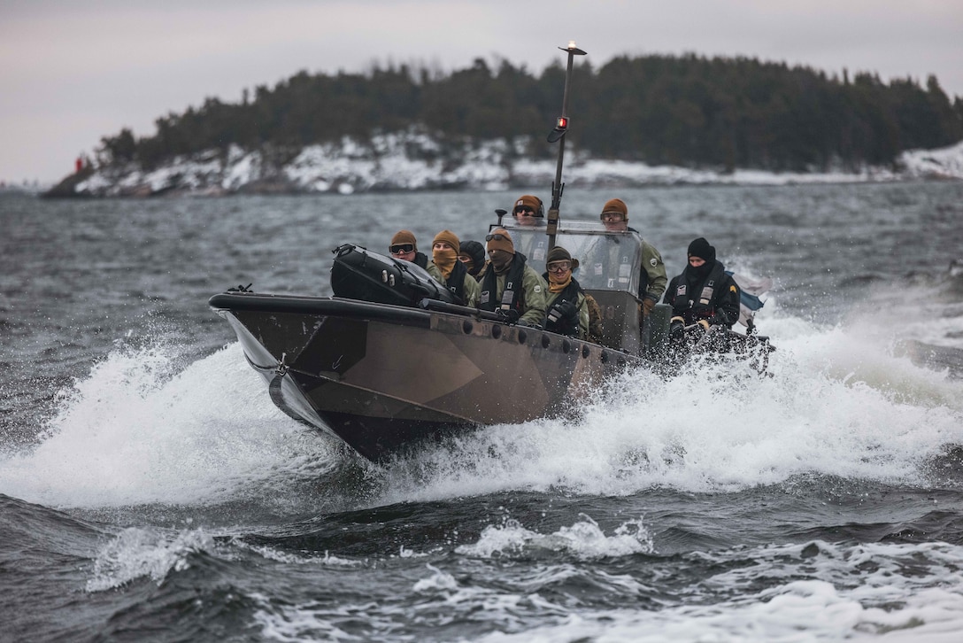 U.S. Marines with Combat Logistics Battalion 6, Combat Logistics Regiment 2, 2nd Marine Logistics Group, drive a Finnish G-Class landing craft while operating the Amy, an unmanned surface vehicle on the Baltic Sea, off the coast of Finland Nov. 25, 2022. Task Force Red Cloud, headquartered by elements of CLB-6, is deployed to Finland in support of Exercises SYD 2022 and Freezing Winds 2022 to enhance U.S. and Finnish select interdependence in the maritime domain; solidify bilateral maritime maneuver within the Finnish littoral environment; and foster strong relationships between U.S. Marine Corps and Finnish Defense Force sustainment units.