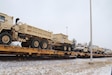 Railcars that were loaded by Soldiers with the Army Reserve’s 411th Engineer Company with military vehicles and equipment are shown Nov. 17, 2022, at Fort McCoy, Wis. Overall the company loaded 128 items on to railcars over the multi-day rail movement at the installation to deploy the equipment eventually to the U.S. Central Command area of responsibility. Five personnel with the Fort McCoy Logistics Readiness Center (LRC) assisted with the rail movement and its coordination. The 411th is the latest of many units over the last decade to hold rail movements at Fort McCoy. As a matter of fact, for the many decades of Fort McCoy’s existence, the capability to transport cargo and equipment to and from the installation by rail has always been there. And it’s a capability that will continue, Fort McCoy LRC officials said. During World War II, for example, the railroad at Fort McCoy was one of the main forms of transportation for bringing troops in for training and home after the war as well as for moving cargo and equipment in and out of the installation. The 411th is headquartered in Cedar Rapids, Iowa.