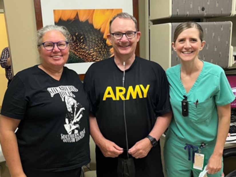 Michelle, Mike, and Maj. (Dr.) Whittney Warren, pulmonologist, BAMC