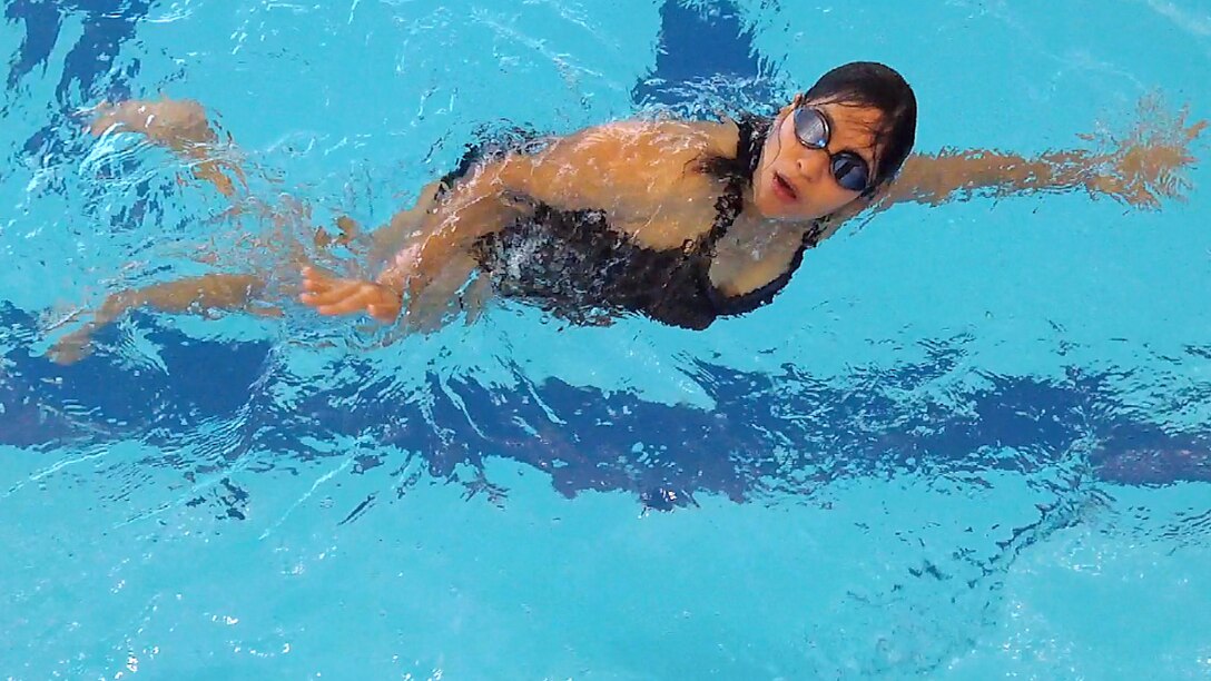 An RSM is seen from above swimming freestyle.