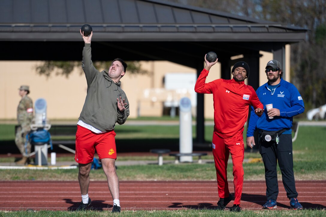 RSMs practice shot put.