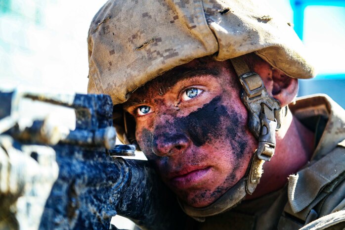 U.S. Marine Corps Rct. Logan B. Wright, a recruit with Golf Company, 2nd Recruit Training Battalion, provides security at a 12 stall event during the crucible at Marine Corps Base Camp Pendleton, California, Nov. 15, 2022.