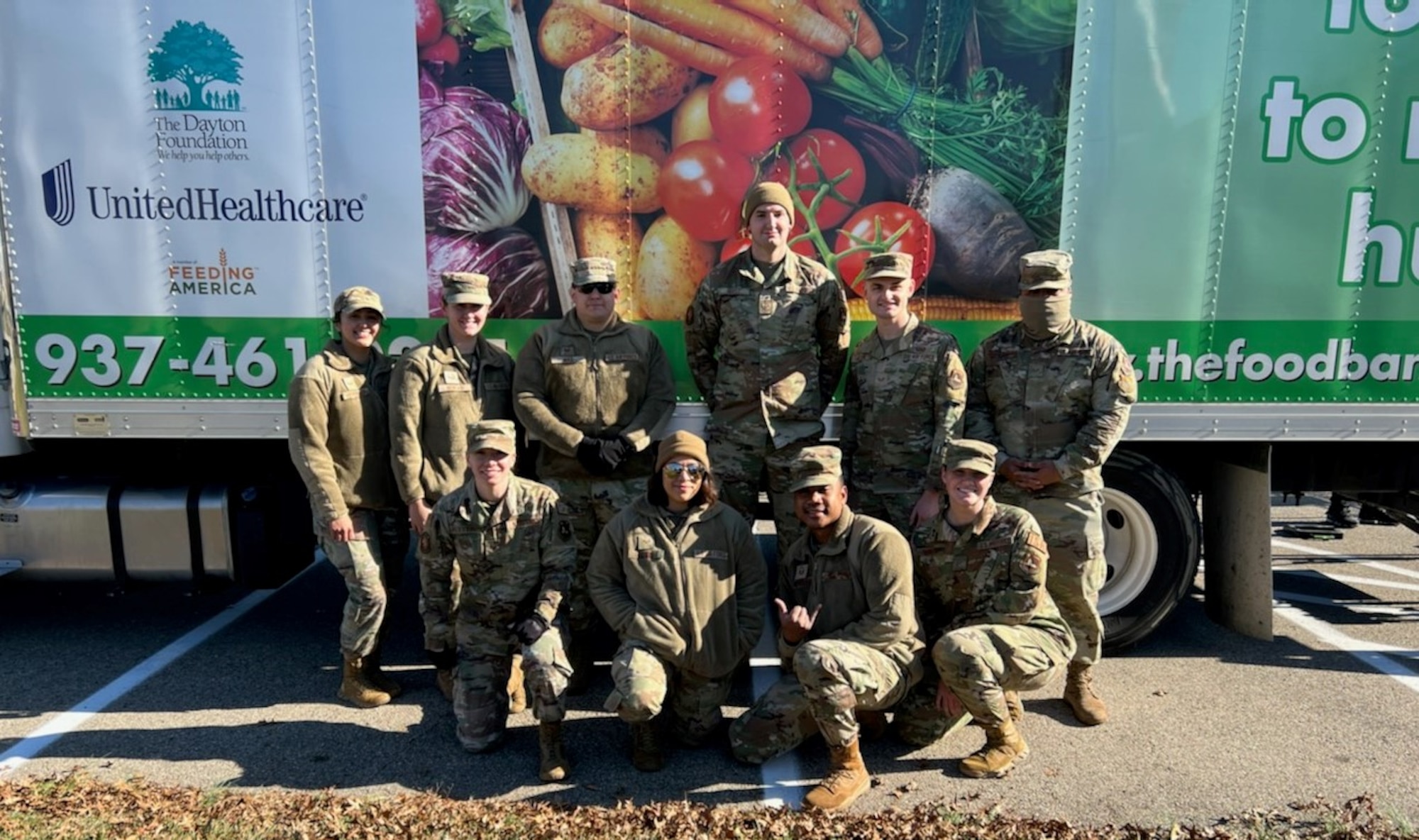 NASIC group photo in front of the Foodbank bus