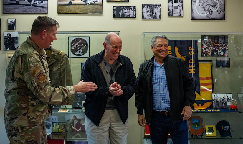 U.S. Air Force Col. Gregory Beaulieu, 633d Air Base Wing commander (right), Senior Master Sgt. (retired) Robin Stewart and Senior Master Sgt. (retired) Herbert Silva celebrate the 633d Air Base Wing Heritage Hall official opening at Joint Base Langley-Eustis, Virginia, Nov. 18, 2022.