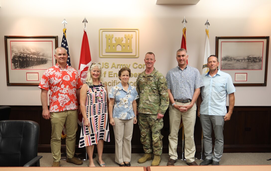 FORT SHAFTER, Hawaii – Members of the Mississippi River Commission pictured at the Pacific Ocean Division Headquarters commenced the 2022 Mekong-Mississippi Sister Rivers Exchange engagement starting with a prep session in Hawaii on July 6, with U.S. Indo-Pacific Command, U.S. Army Pacific, and the Asia Pacific Center of Security Studies. Delegation members include Brig. Gen. Kirk Gibbs (center-right), Pacific Ocean Division commanding general, located at Fort Shafter, Hawaii, and Mississippi River Commission members: Maj. Gen. Diana M. Holland (center-left), commanding general of Mississippi Valley Division located in Vicksburg, Mississippi and Mississippi River Commission president, Norma Jean Mattei (second to left), Ph.D., professor in the Department of Civil and Environmental Engineering at the University of New Orleans, Col. Geoff Van Epps (far-left), commander of the Northwestern Division, located in Portland, Oregon, Rear Adm. Benjamin Evans (second to right), director of the National Oceanic and Atmospheric Administration Office of Coast Survey, located in Silver Spring, Maryland, and Col. Andy Pannier (far right), deputy commander, Mississippi Valley Division, located in Vicksburg, Mississippi.