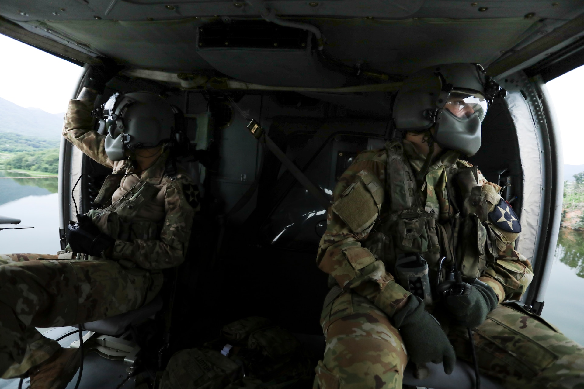 Sgt. Jake Mellott and Spc. Prentice Urban, observe the flight path for any obstructions, September 1, 2022, Camp Humphreys, Republic of Korea. (U.S. Army photo by Sgt. Oscar Toscano)