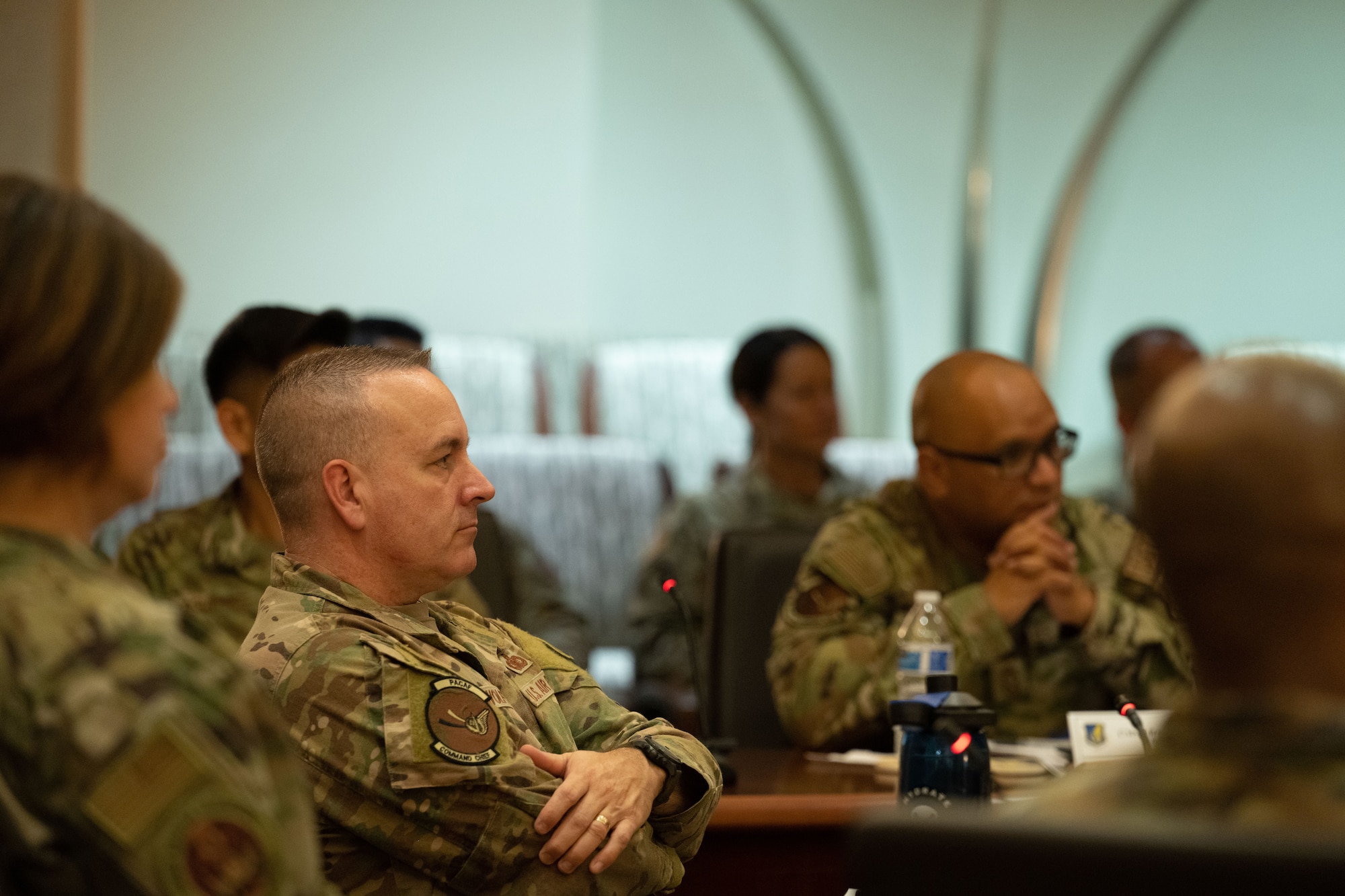 Chief Master Sgt. David Wolfe, Pacific Air Forces command chief, listens to opening remarks during November’s Air Force Senior Enlisted Leader Council meeting, Hickam Air Force Base, Hawaii, Nov. 8, 2022. One of the roles and responsibilities of the AFSELC is to elevate the caliber and performance of enlisted Airmen through deliberate development initiatives. (U.S. Air Force photo by Tech. Sgt. Hailey Haux)