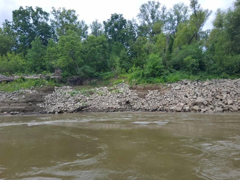 Congratulations to the Memphis District for recently completing a $6M Bipartisan Infrastructure Law (BIL)-funded project at Below Knowlton, Arkansas. 

“Work to complete revetment stone repairs began on Sep. 27, 2022,” Project Manager Zach Cook said. “Work was then completed ahead of the required completion date on Nov. 8, 2022, despite record low water conditions and stone delivery delays due to tow restrictions.” 

Contractor Luhr Bros., Inc. from Columbia, Illinois, executed the project work, which consisted of placing approximately 163,000 tons of Graded Stone C (400-pound maximum stone-size) to repair two bank failures. Repairing these banks ultimately restored them to stable slopes.
