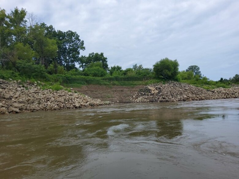 Congratulations to the Memphis District for recently completing a $6M Bipartisan Infrastructure Law (BIL)-funded project at Below Knowlton, Arkansas. 

“Work to complete revetment stone repairs began on Sep. 27, 2022,” Project Manager Zach Cook said. “Work was then completed ahead of the required completion date on Nov. 8, 2022, despite record low water conditions and stone delivery delays due to tow restrictions.” 

Contractor Luhr Bros., Inc. from Columbia, Illinois, executed the project work, which consisted of placing approximately 163,000 tons of Graded Stone C (400-pound maximum stone-size) to repair two bank failures. Repairing these banks ultimately restored them to stable slopes.