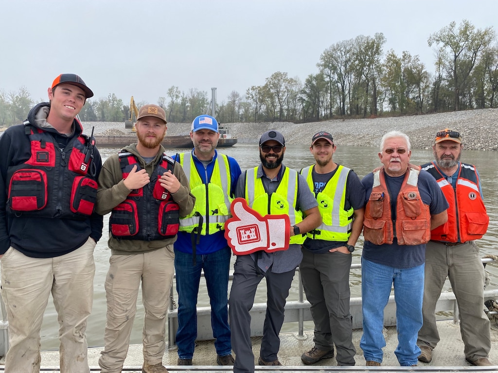Congratulations to the Memphis District for recently completing a $6M Bipartisan Infrastructure Law (BIL)-funded project at Below Knowlton, Arkansas. 

“Work to complete revetment stone repairs began on Sep. 27, 2022,” Project Manager Zach Cook said. “Work was then completed ahead of the required completion date on Nov. 8, 2022, despite record low water conditions and stone delivery delays due to tow restrictions.” 

Contractor Luhr Bros., Inc. from Columbia, Illinois, executed the project work, which consisted of placing approximately 163,000 tons of Graded Stone C (400-pound maximum stone-size) to repair two bank failures. Repairing these banks ultimately restored them to stable slopes.