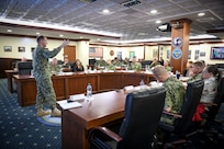 Adm. Stuart B. Munsch, commander, U.S. Naval Forces Europe-Africa (NAVEUR-NAVAF) and commander, Allied Joint Force Command Naples, discusses priorities, leadership, and maritime warfighting during the Commander, Task Force (CTF) Commanders Conference onboard Naval Support Activity Naples, Italy, Nov. 30, 2022.