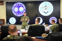 Vice Adm. Thomas Ishee, center left, commander, U.S. Sixth Fleet and commander, Naval Striking and Support Forces NATO, discusses leadership and maritime warfighting during the Commander, Task Force (CTF) Commanders Conference onboard Naval Support Activity Naples, Italy, Nov. 30, 2022.