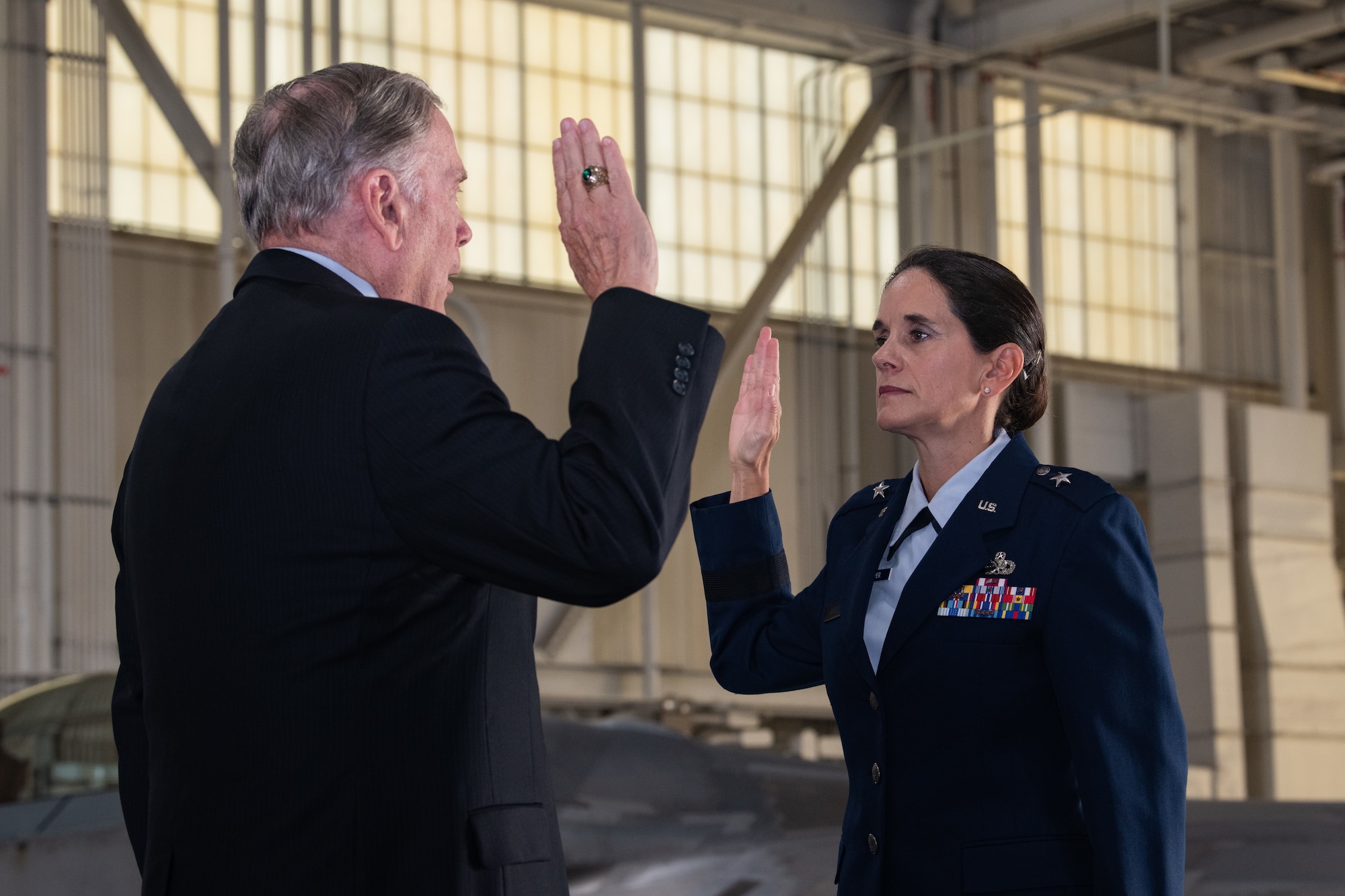 Gen. John P. Jumper swears in Brig. Gen. Catherine M. Jumper after she was promoted.