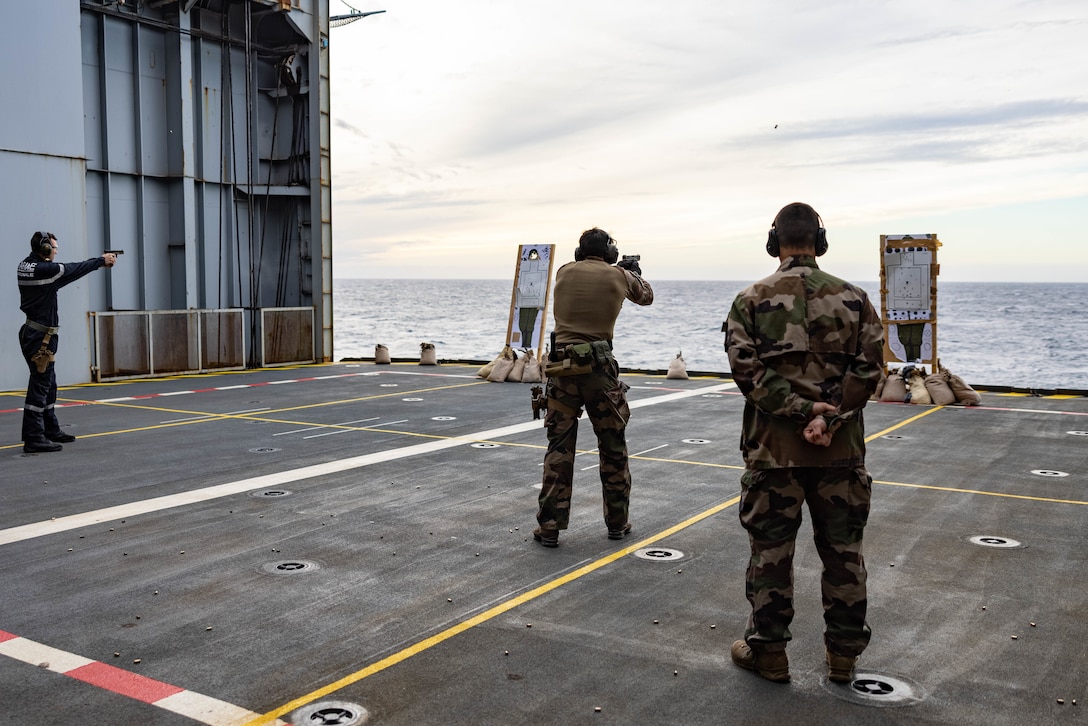 Officers with the French Army conduct pistol training aboard Porte Helicopteres Amphibie Dixmude, the French Navy’s Amphibious Helicopter Carrier, during Exercise NARVAL 2022 off the coast of Toulon, France, Nov. 21, 2022. Exercise NARVAL is designed to assess the potential for future battalion or brigade-level amphibious exercises with French amphibious forces.