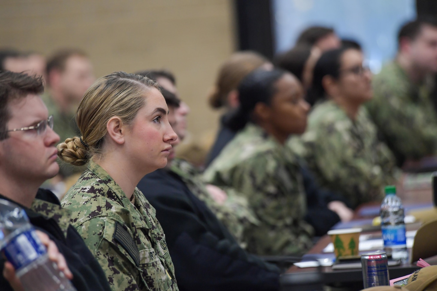 VIRGINIA BEACH, Virginia (December 1, 2022) – Junior officers listen to Capt. Jeff Heames, director of Surface Officer Assignments at PERS-41, during the inaugural Naval Surface Force Atlantic Junior Officer Training Symposium (JOTS), Dec. 1. 126 junior officers attended JOTS, and had the opportunity to network with, learn from, and listen to senior U.S. Navy leaders. (U.S. Navy photo by Mass Communication Specialist 1st Class Jacob Milham)