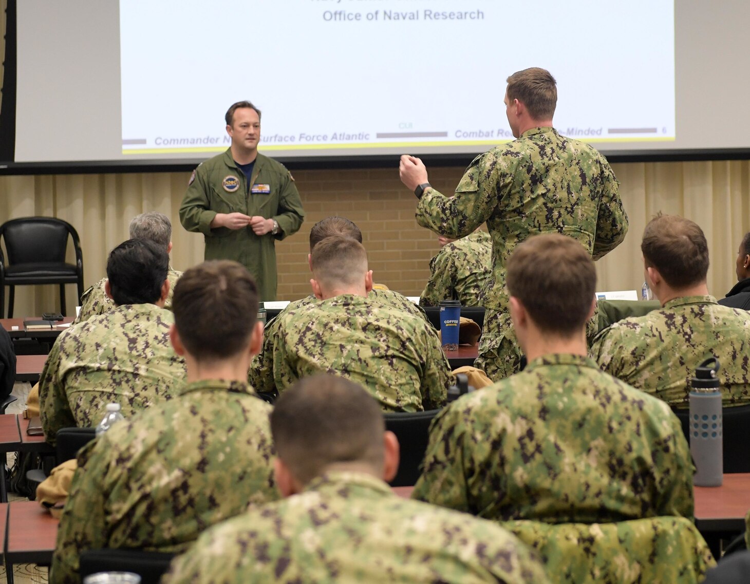 VIRGINIA BEACH, Virginia (December 1, 2022) – Lt. John-Rex Spivey, Navy Junior Officer Counsel surface warfare officer lead, answers questions during the inaugural Naval Surface Force Atlantic Junior Officer Training Symposium (JOTS), Dec. 1. 126 junior officers attended JOTS, and had the opportunity to network with, learn from, and listen to senior U.S. Navy leaders. (U.S. Navy photo by Mass Communication Specialist 1st Class Jacob Milham)