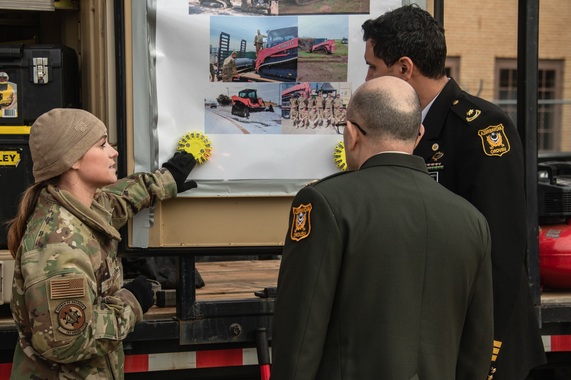 an airman shows wireless LED flares used by Airmen for visibility