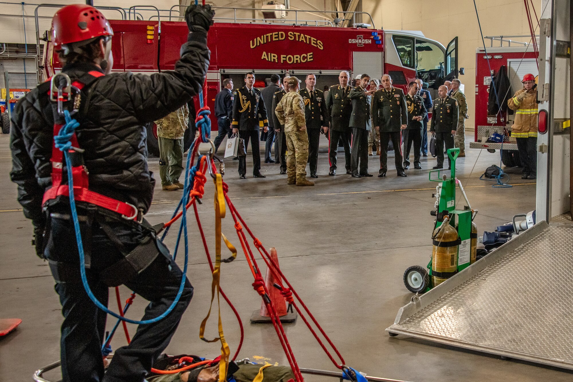 Air Force firefighters demonstrate high-line rescue operations