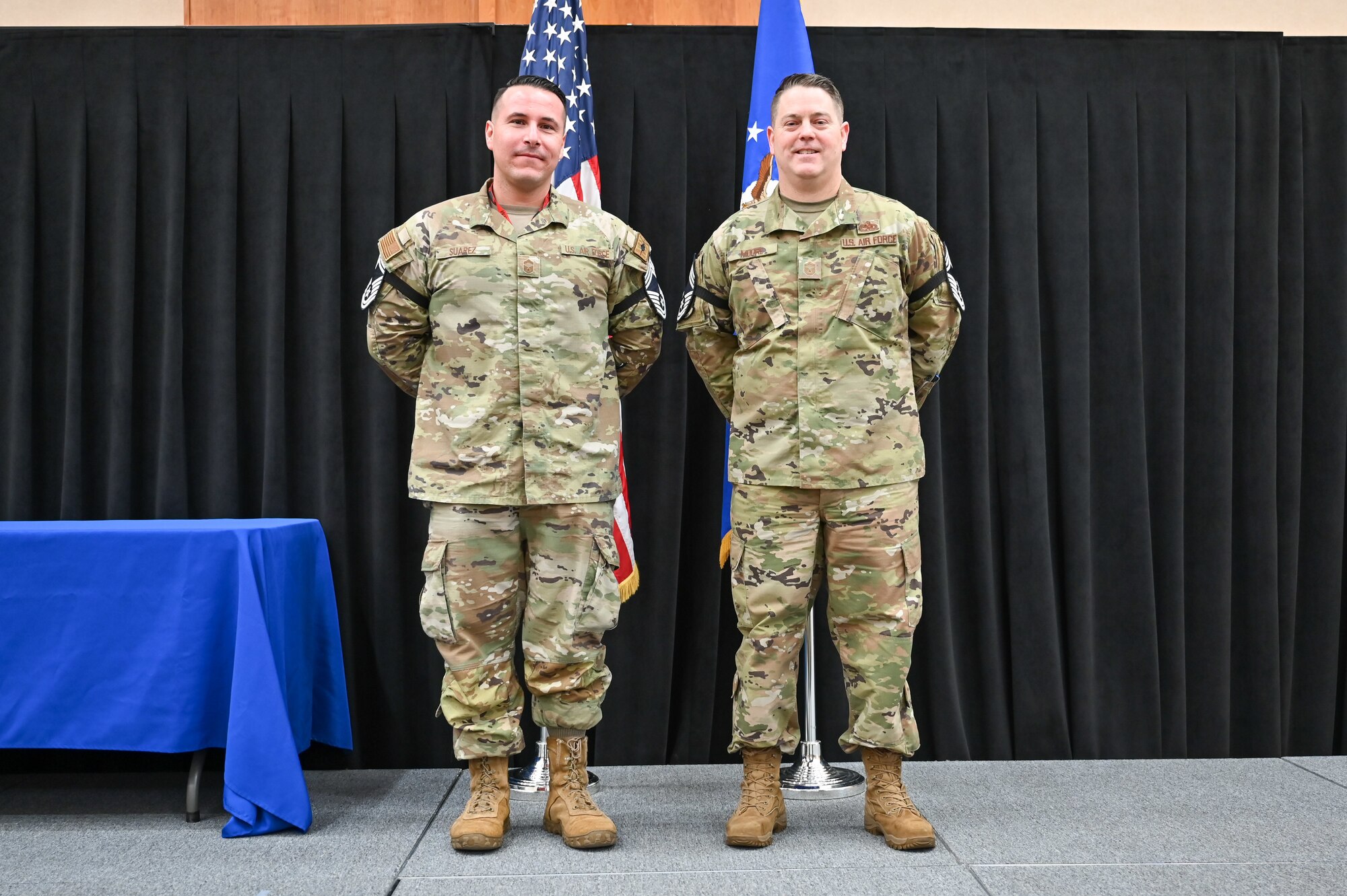 Chief Master Sgt. (select) Christian Suarez, 388th Maintenance Squadron, and Chief Master Sgt. (select) Leondas Moore, 34th Fighter Generation Squadron, pose for a photo