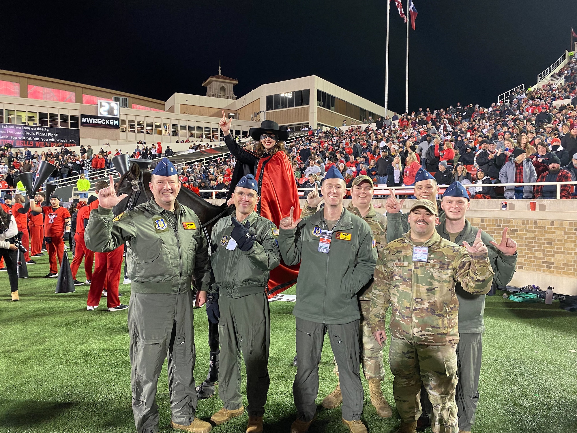 Members of the 507th Air Refueling Wing, Tinker Air Force Base, Oklahoma, participates in a flyover of a Texas Tech football game in honor of Veteran's Day weekend with Gen. Charles Q. Brown, Chief of Staff of the Air Force in attendance.