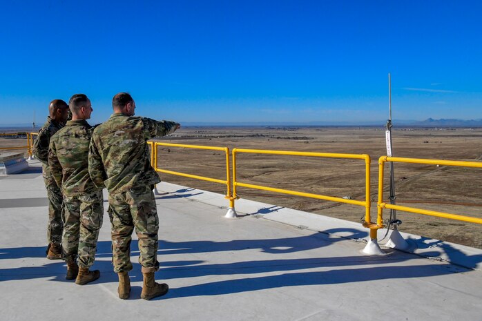 Reconnaissance Wing commander and Lt. Gen. Kevin Kennedy, 16th AF commander, survey Beale Air Force Base and the Sutter Buttes, on top of the Upgraded Early Warning Radar at 7th Space Warning Squadron (SWS) at Beale Air Force Base, California, Nov. 29, 2022.