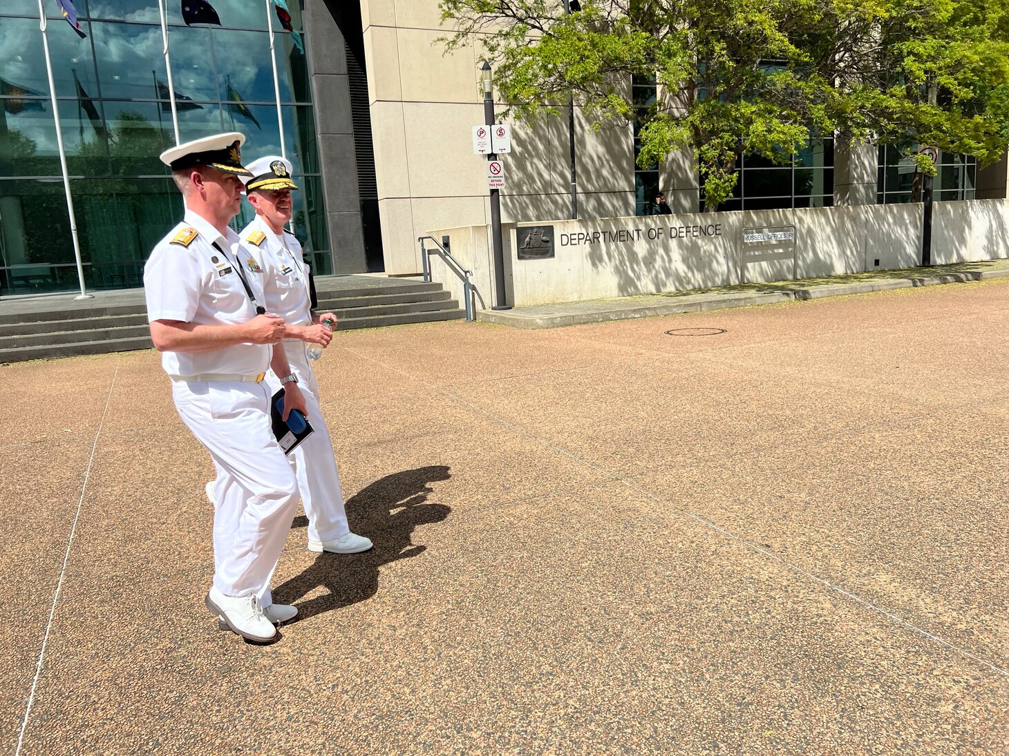 Rear Adm. Ron Piret, Commander, Naval Meteorology and Oceanography Command, walks with Commodore Stewart Dunne, Director General Maritime Geospatial and Australian Geospatial-Intelligence Organisation during his visit to Australia during a scheduled visit to the region, Nov 7-11, 2022.