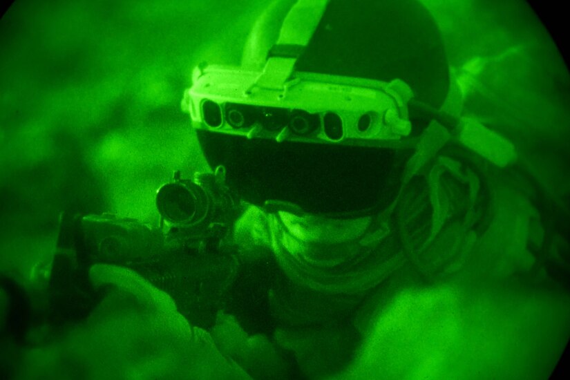 A soldier wears goggles.