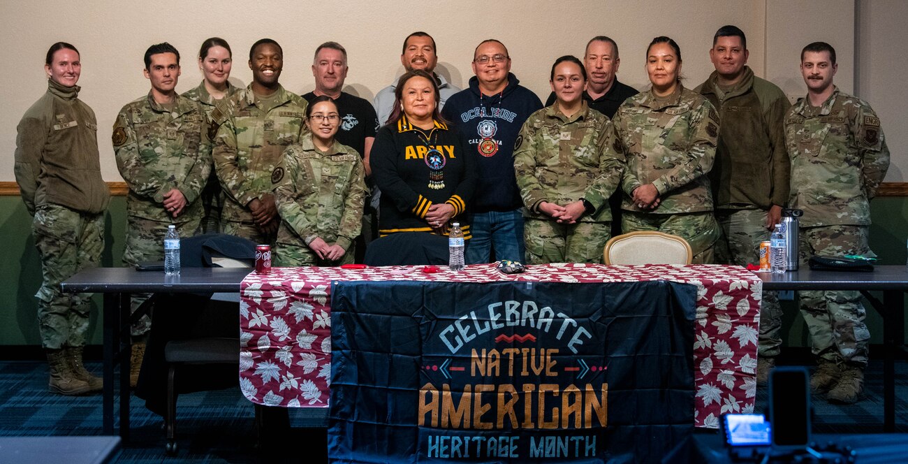 Member’s of Team Minot pose with guest speakers during a Native American Veteran panel at Minot Air Force Base, North Dakota, Nov. 17, 2022. The panel was held to celebrate Native American Heritage Month and it showcased how the military is a diverse force. (U.S. Air Force photo by Master Sgt. Ryan Bell)