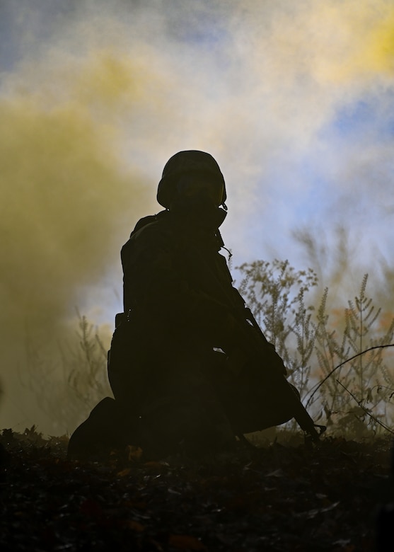 A Joint Base Andrews Airman awaits instructions during an Airman Combat Skills Training exercise at JBA, Md., December 2, 2022. The semi-annual training included a refresher course in Chemical, Biological, Radiological, and Nuclear and Mission-Oriented Protective Posture. (U.S. Air Force photo by Airman 1st Class Isabelle Churchill)