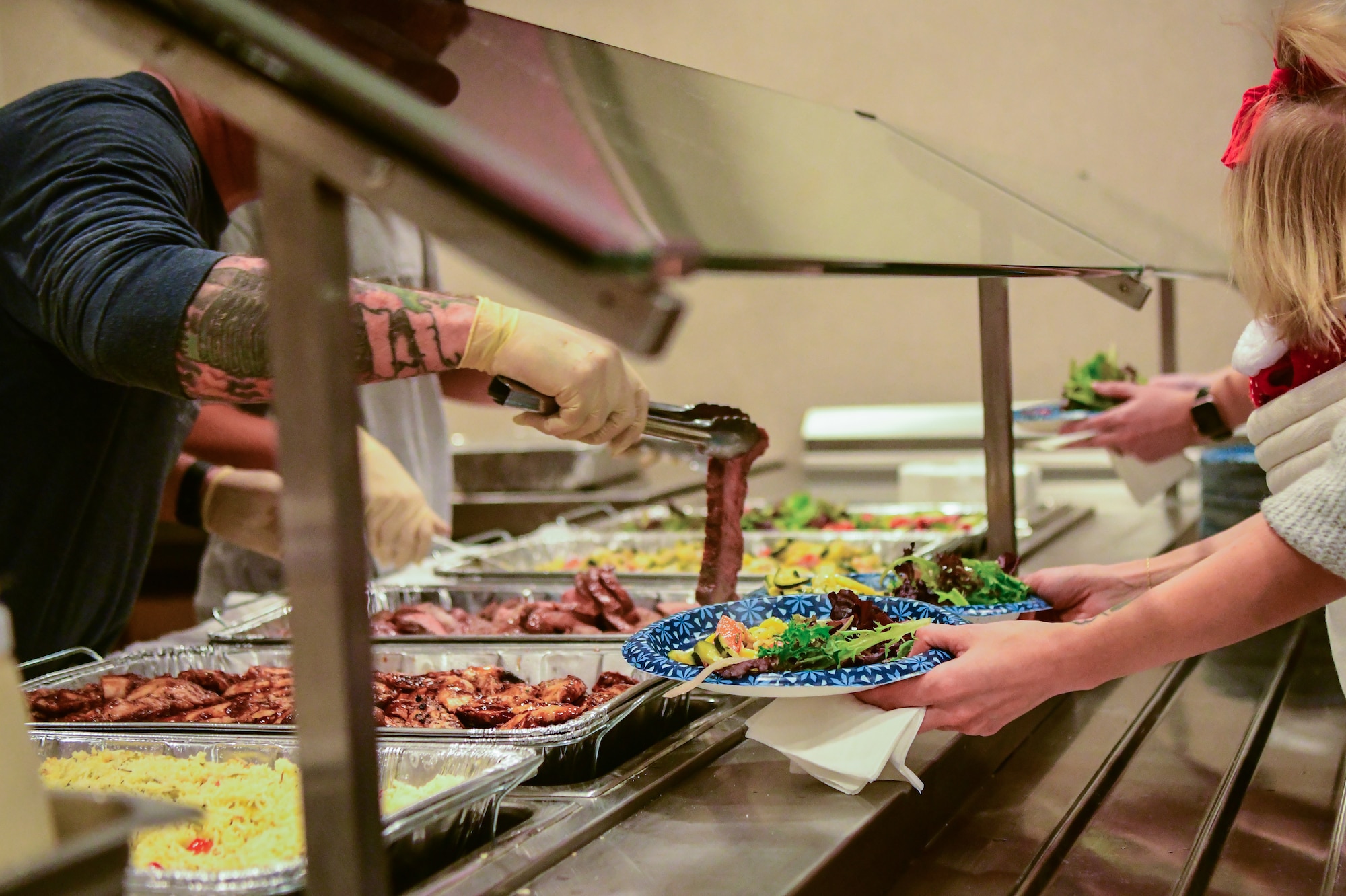 Food is being served at the Hearts Apart event at the Recce Point Club on Beale Air Force Base, Calif. on Dec. 1, 2022.