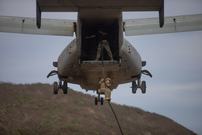 U.S. Marines with 3d Littoral Combat Team, 3d Marine Littoral Regiment, 3d Marine Division conduct fast rope training at Marine Corps Base Hawaii, Nov. 29, 2022. This training prepares the company for helicopter-borne insertion and extraction operations. (U.S. Marine Corps photo by Lance Cpl. Terry Stennett III)
