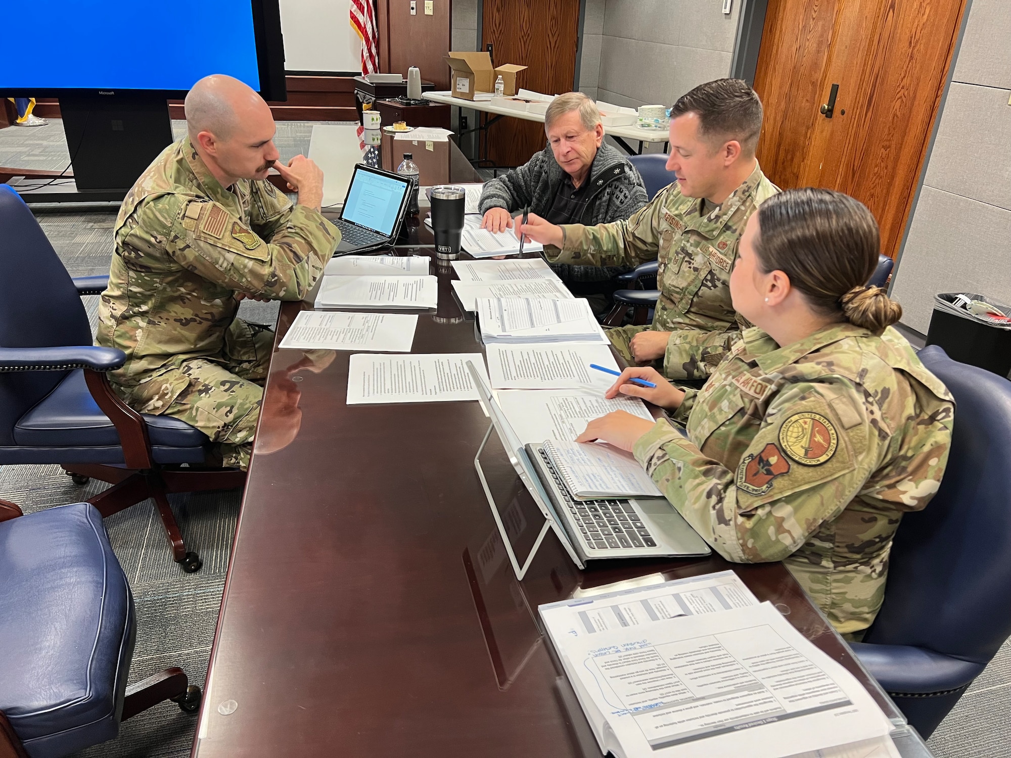 Air Force professional military education instructors discuss Non-Commissioned Officer Academy curriculum with writers from the Barnes Center for Enlisted Education, Maxwell Air Force Base-Gunter Annex, Nov. 29, 2022.