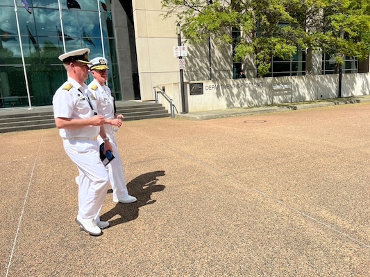 Rear Adm. Ron Piret, Commander, Naval Meteorology and Oceanography Command, walks with Commodore Stewart Dunne, Director General Maritime Geospatial and Australian Geospatial-Intelligence Organisation during his visit to Australia during a scheduled visit to the region, Nov 7-11, 2022.