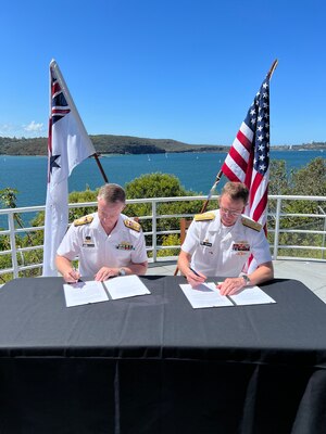 Rear Adm. Ron Piret, Commander, Naval Meteorology and Oceanography Command, signed an agreement with Commodore Stewart Dunne, Director General Maritime Geospatial and Australian Geospatial-Intelligence Organisation during his visit to Australia during a scheduled visit to the region, Nov 7-11, 2022.