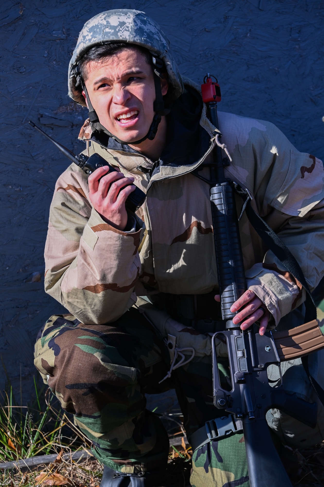 A Joint Base Andrews Airman practices radio communication during Airman Combat Skills Training at JBA, Md., Dec. 2, 2022. ACST allowed each Airman’s basic combat skills to be evaluated in a simulated environment. (U.S. Air Force photo by Airman 1st Class Isabelle Churchill)