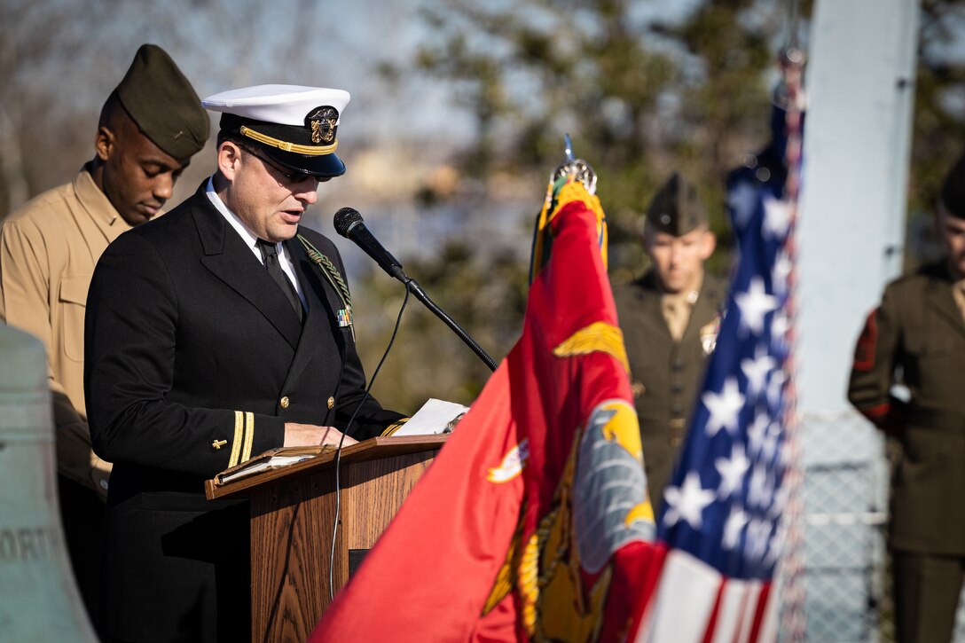 U.S. Navy Chaplain from 1st Battalion, 8th Marine Regiment, reads a prayer during a naturalization ceremony aboard the Battleship USS North Carolina, Dec. 2, 2022. 18 Marines from 15 countries and five continents swore the Oath of Allegiance and received their citizenship. Naturalization is the process by which U.S. citizenship is granted to a foreign citizen after he or she fulfills the requirements to become a citizen established by Congress in the Immigration and Nationality Act of 1965. (U.S. Marine Corps photo by Lance Cpl. Noah Seal)