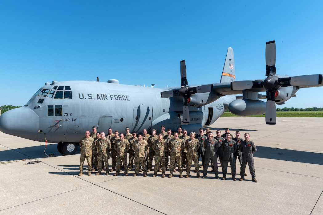 Airmen posing for group photo.