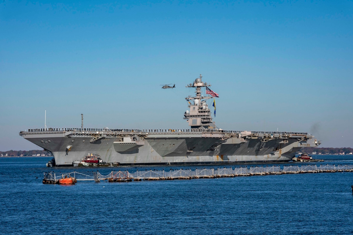 A large ship moves through the water.