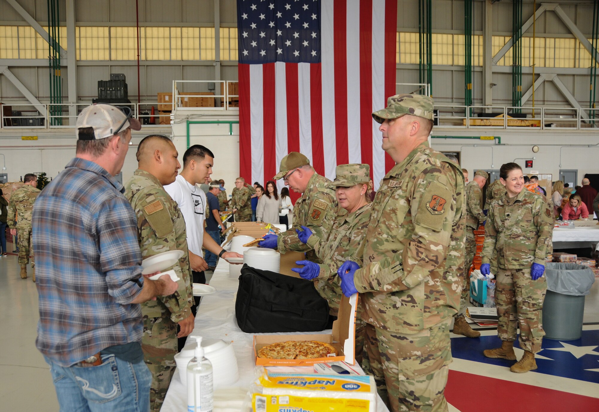 Members and their families join together to attend the Key Field Family Day.