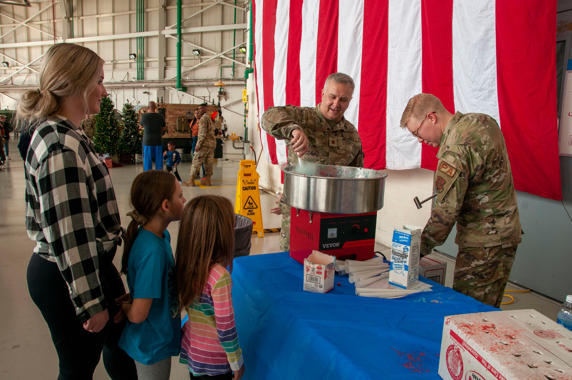 Members and their families join together to attend the Key Field Family Day.