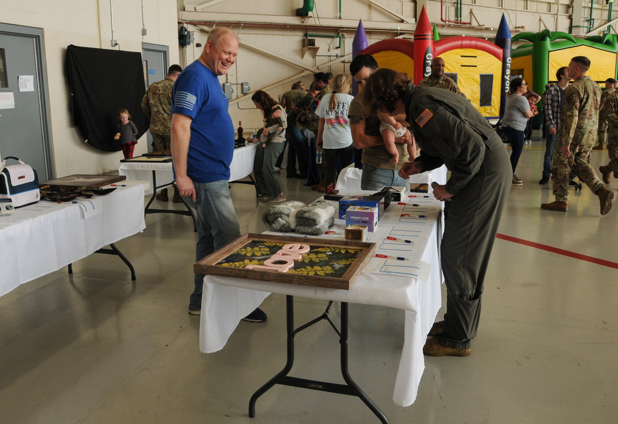 Members and their families join together to attend the Key Field Family Day.