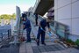 Sailors attached to Commander, Fleet Activities Yokosuka (CFAY) take part in a community service project to clean up Friendship Bridge. Friendship Bridge is a bridge built to connect CFAY to its surrounding city,